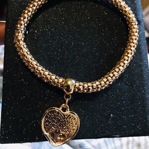 Rose gold ,silver,and gold tree of life bracelet